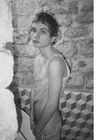 Portrait en noir et blanc par Larry Clark dans Vogue Hommes International